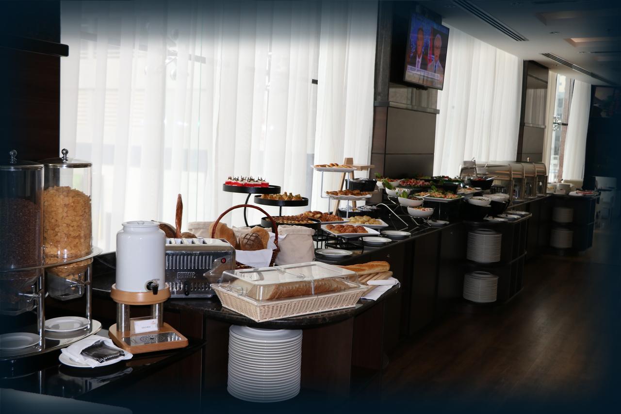מנאמה Orange Suites Hotel מראה חיצוני תמונה