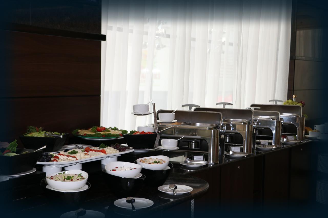 מנאמה Orange Suites Hotel מראה חיצוני תמונה